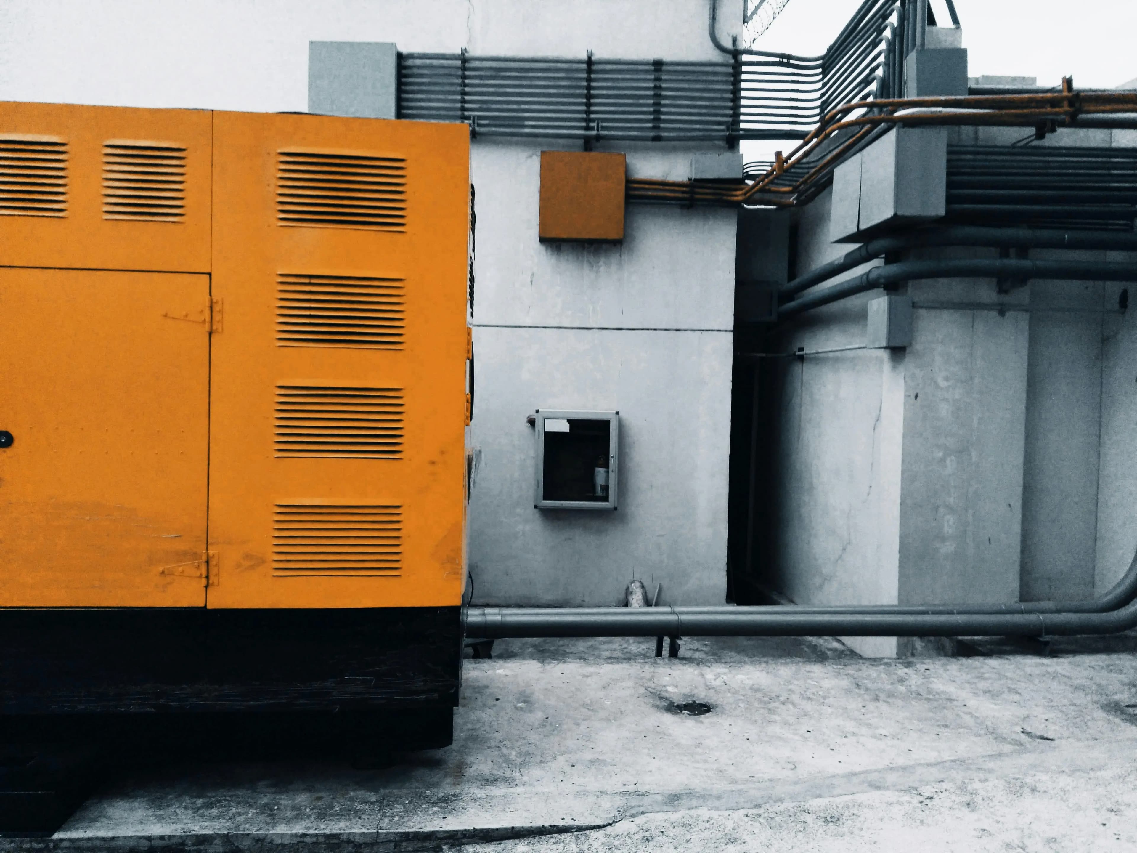 Photo of mechanical prototype with CAD overlay showing structural simulation
